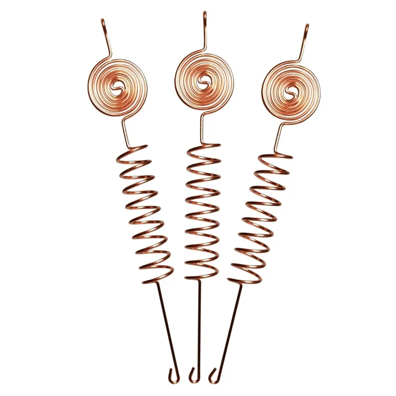 Three copper Tesla Coil antennas on a white background, each with a flat spiral at the top, a coiled spring section and a straight stake ending in a hook